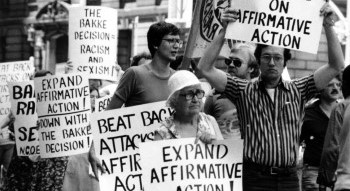 Black and white image of a group of protesters holding sign supporting affirmative action