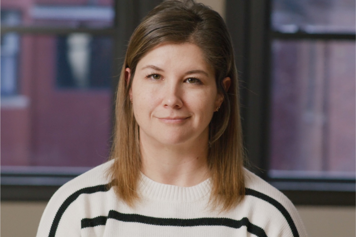 Image of a woman smirking