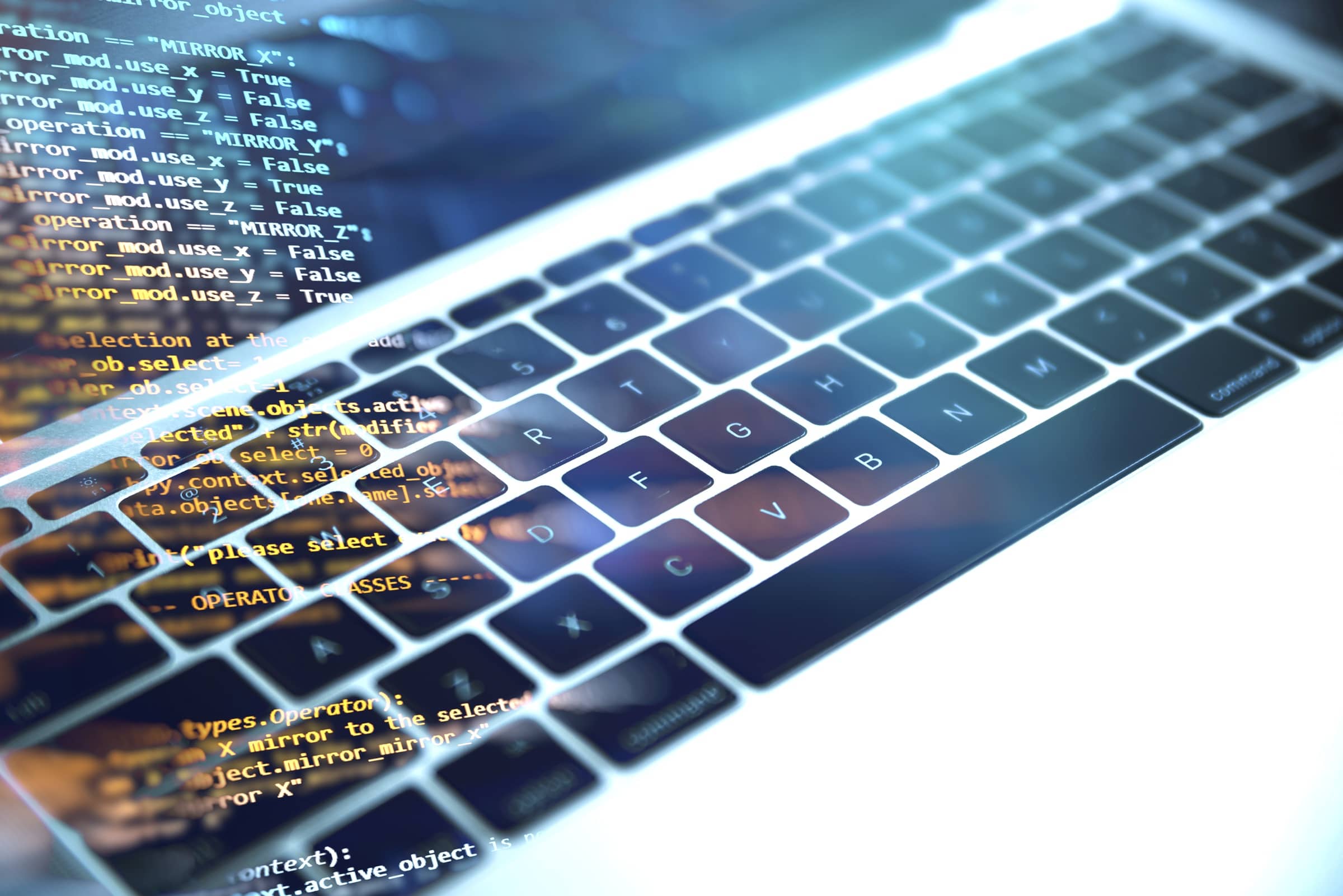 Illuminated keyboard with source code in the background, and a left hand holding an "html" button.