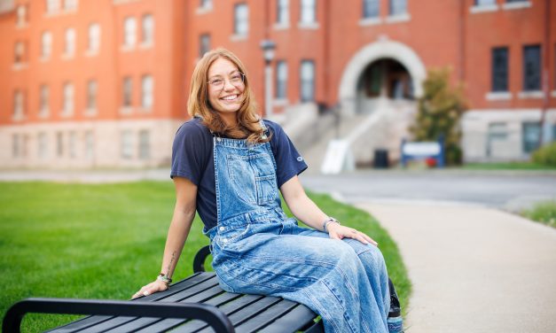 Columbia College senior Marianna Tomc poses for a photo in front of St. Clair Hall.