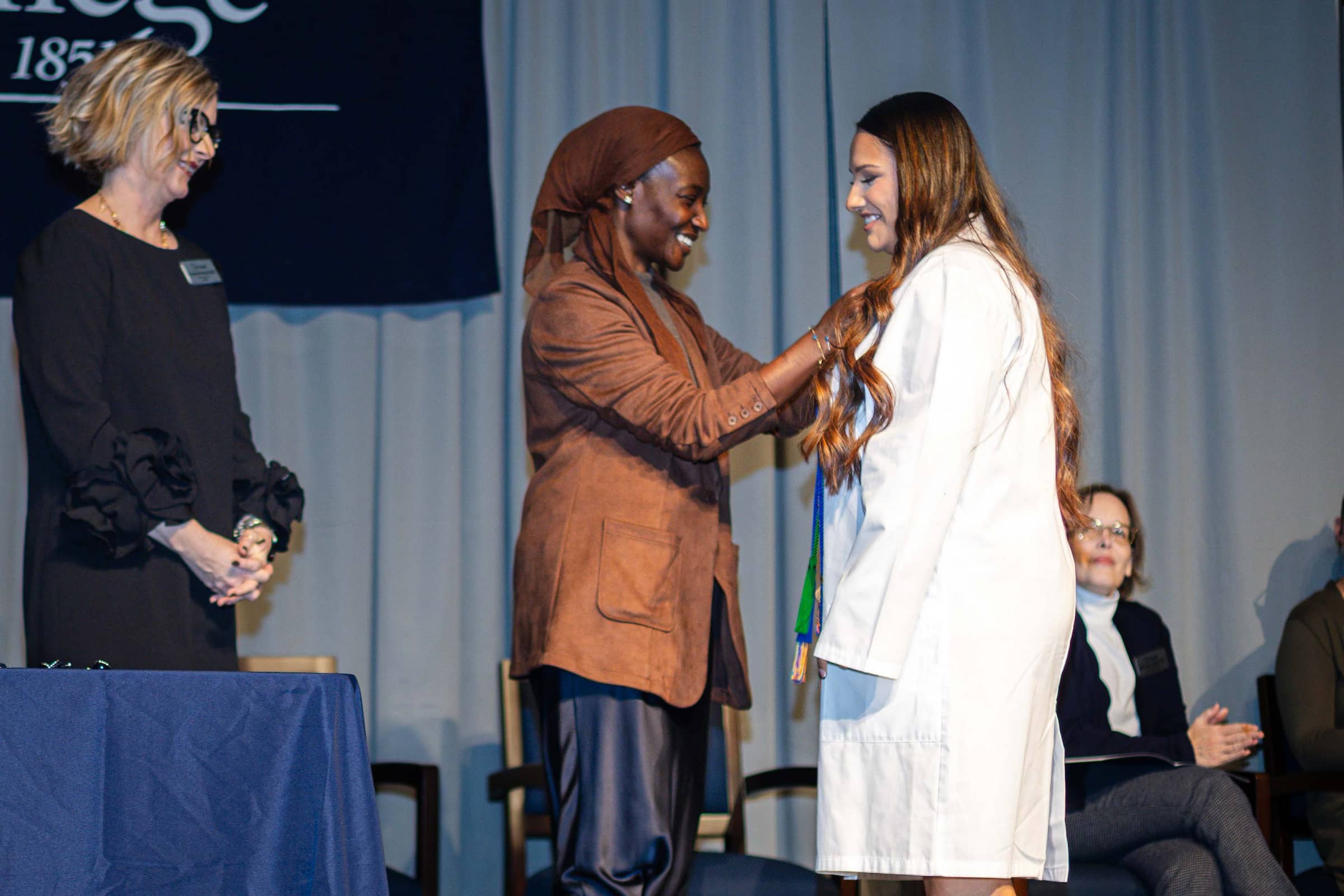 Graduate receiving her pin during the nurse's pinning ceremony.