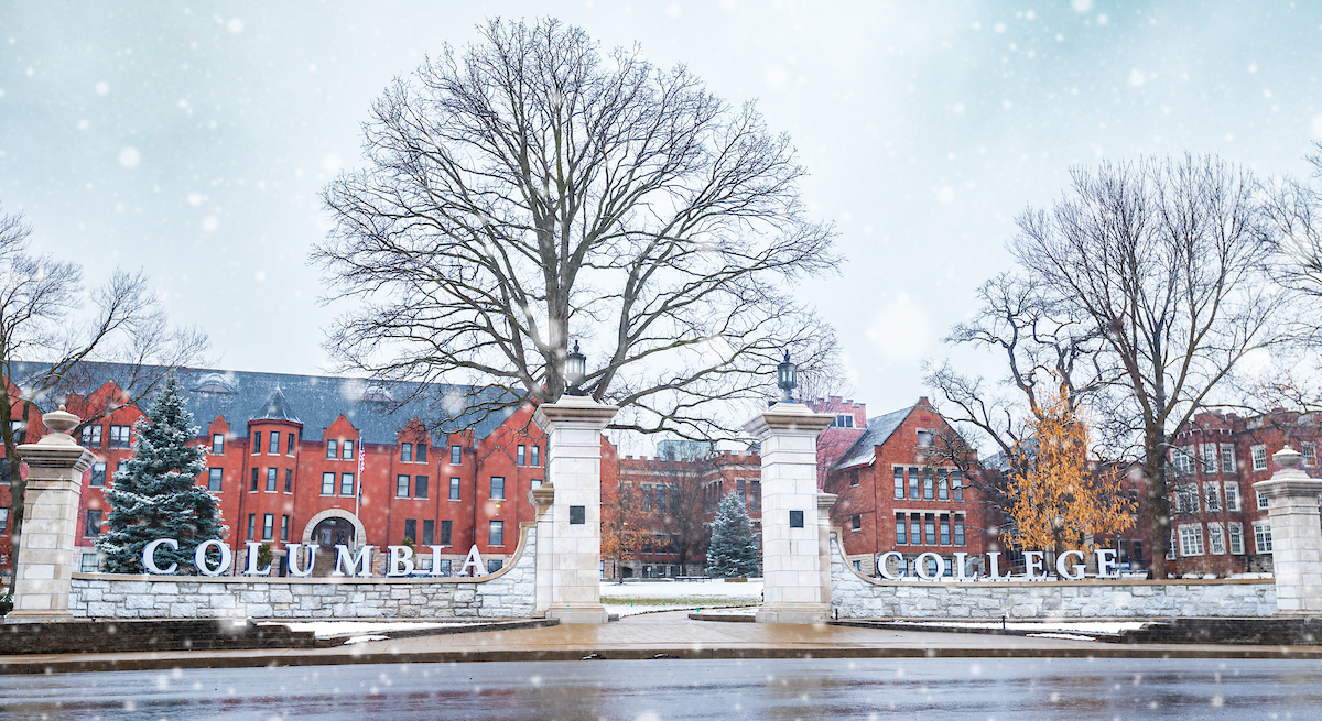 Front image of the snow dusted Columbia College campus in the winter.